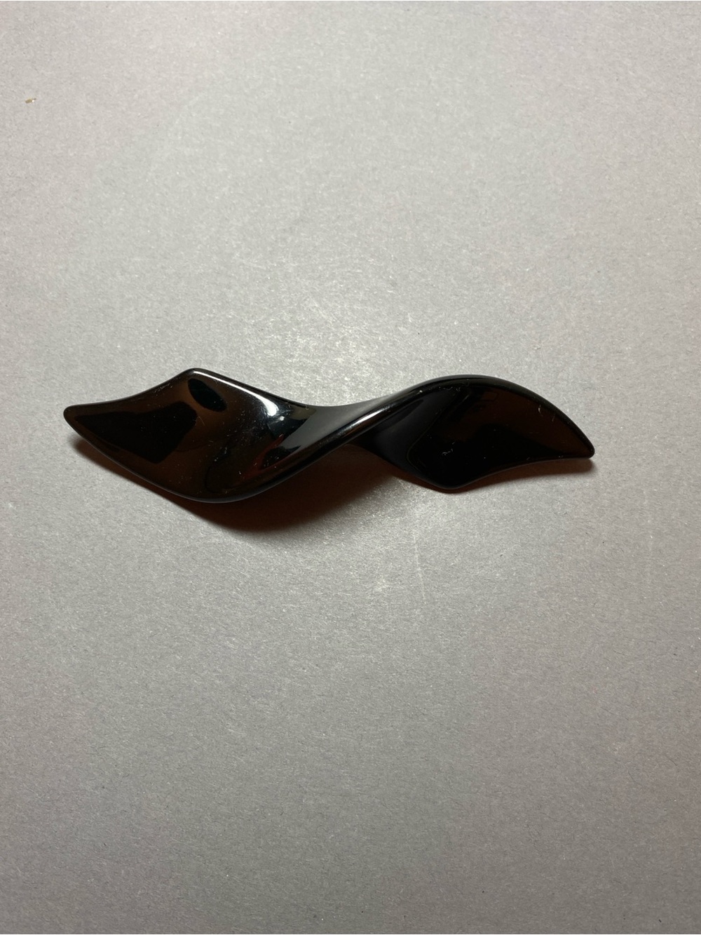 Vintage Monet black acrylic abstract twist brooch pin